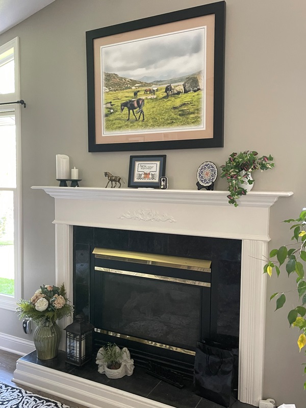 "Horses of Wyoming" hangs above the fireplace
