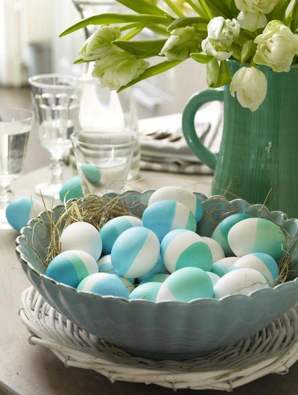 Colored eggs in a bowl.