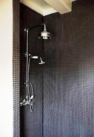 Shower is tiled.