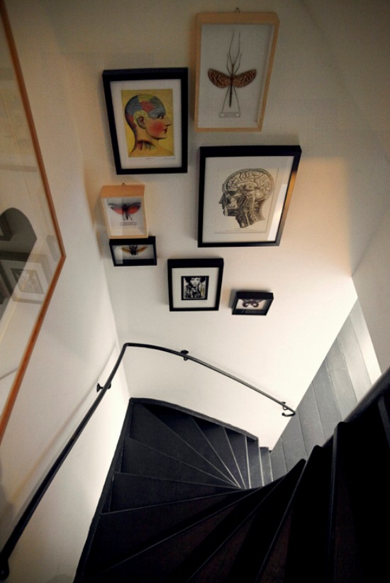 Stained black stairs to the upper floors.