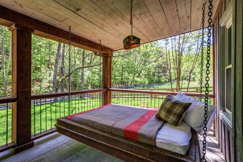 Front porch with swinging bed.