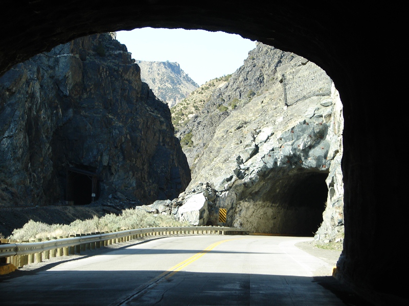 Three tunnels cut right through the mountain rock . . . for both road and railroad. Construction of US 20 came after the railroad.