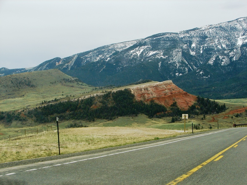 The Chugwater Formation is stunning against a soft pallet of green and the cool hues of the landscape.